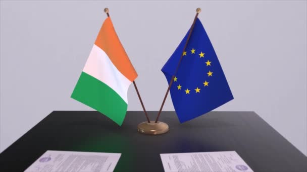 爱尔兰和欧盟的国旗在桌上 与国家3D动画的政治交易或商业协议 — 图库视频影像