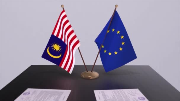 马来西亚和欧盟的国旗在桌上 与国家3D动画的政治交易或商业协议 — 图库视频影像