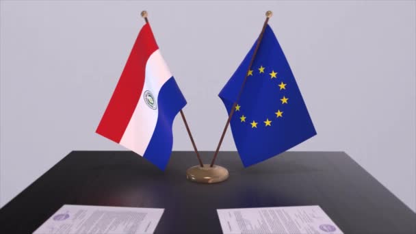 巴拉圭和欧盟的国旗在桌面上 与国家3D动画的政治交易或商业协议 — 图库视频影像