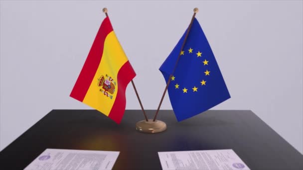 西班牙和欧盟的国旗在桌上 与国家3D动画的政治交易或商业协议 — 图库视频影像