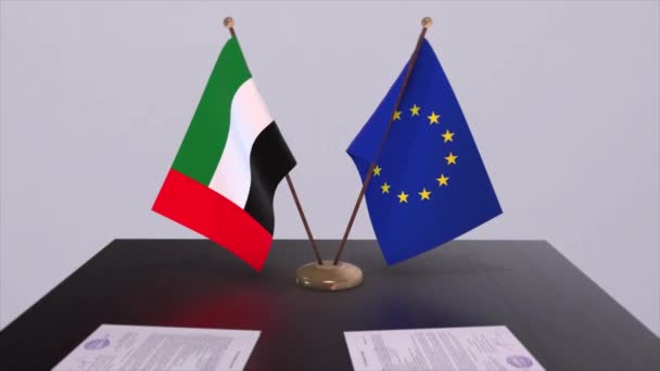 阿联酋和欧盟的国旗在桌上 与国家3D动画的政治交易或商业协议 — 图库视频影像