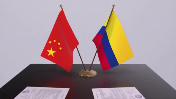 コロンビアと中国の国旗 政治概念 パートナー国間の取引 政府間のパートナーシップ協定 — ストック動画