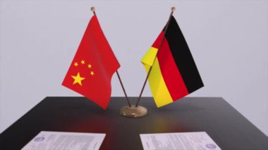 Almanya ve Çin bayrağı. Siyaset konsepti, ülkeler arasında ortaklık anlaşması. Hükümetlerin ortaklık anlaşması