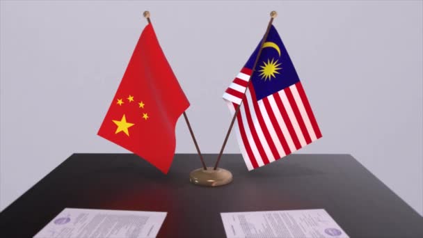 马来西亚和中国的国旗 政治概念 国家间的伙伴交易 各国政府的伙伴关系协定 — 图库视频影像