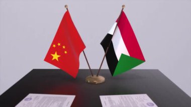 Sudan ve Çin bayrağı. Siyaset konsepti, ülkeler arasında ortaklık anlaşması. Hükümetlerin ortaklık anlaşması