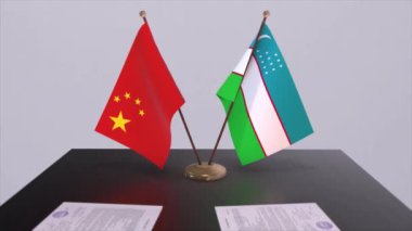 Özbekistan ve Çin bayrağı. Siyaset konsepti, ülkeler arasında ortaklık anlaşması. Hükümetlerin ortaklık anlaşması