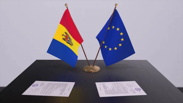Moldova and EU flag on table. Politics deal or business agreement with country 3D illustration.