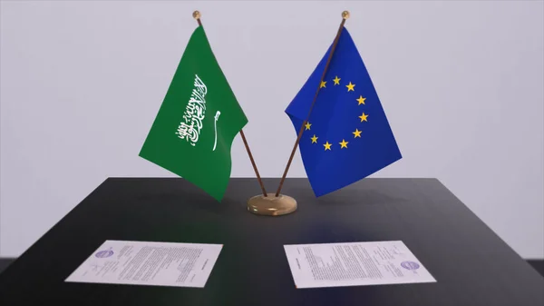Saudi Arabia and EU flag on table. Politics deal or business agreement with country 3D illustration.