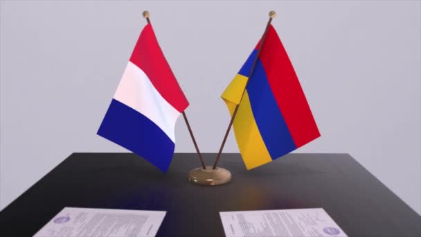 Armenien Och Frankrike Nationella Flaggor Bordet Diplomatisk Konferensrum Politikavtal — Stockvideo