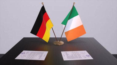 Ireland and Germany flag, politics relationship, national flags. Partnership deal 3D illustration.