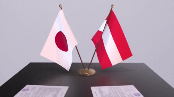 Österrike Och Japan Nationella Flaggor Politisk Överenskommelse Diplomatiskt Möte Politik — Stockvideo
