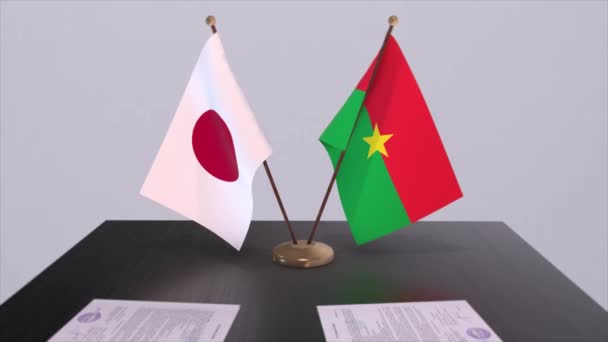 布基纳法索和日本国旗 政治交易 外交会议 政治和商业动画 — 图库视频影像