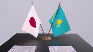 Kazakistan ve Japonya ulusal bayrakları, siyasi anlaşma, diplomatik toplantı. Politika ve iş animasyonu
