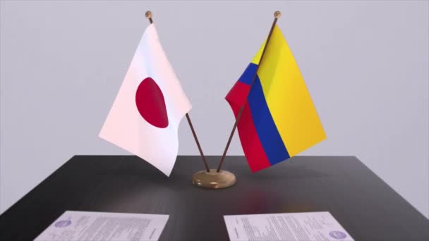 コロンビアと日本の国旗 政治取引 外交会議 ビジネスアニメーション — ストック動画