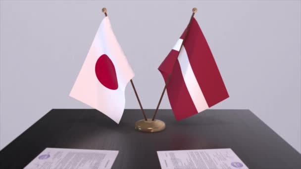 Lettland Och Japan Nationella Flaggor Politisk Överenskommelse Diplomatiskt Möte Politik — Stockvideo