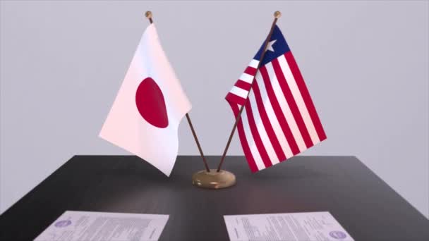 Nationalflaggen Liberias Und Japans Politische Einigung Diplomatisches Treffen Animation Aus — Stockvideo