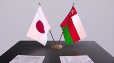 Umman ve Japonya ulusal bayrakları, politik anlaşma, diplomatik toplantı. Politika ve iş animasyonu