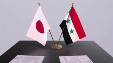 Suriye ve Japonya ulusal bayrakları, siyasi anlaşma, diplomatik toplantı. Politika ve iş animasyonu