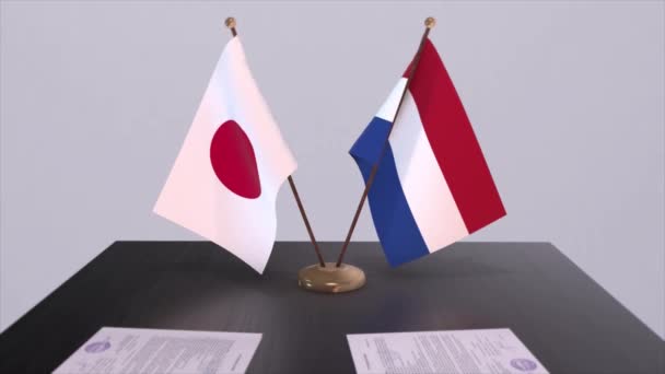 Flagi Narodowe Holandii Japonii Porozumienie Polityczne Spotkanie Dyplomatyczne Polityka Aktywizacja — Wideo stockowe