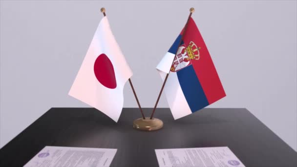 Serbien Och Japan Nationella Flaggor Politisk Uppgörelse Diplomatiskt Möte Politik — Stockvideo