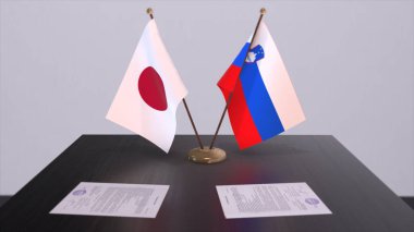 Slovenya ve Japonya ulusal bayrakları, siyasi anlaşma, diplomatik toplantı. Politika ve iş dünyası 3D illüstrasyon.