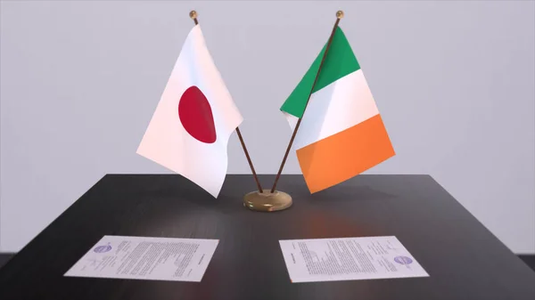 Flagi Narodowe Irlandii Japonii Porozumienie Polityczne Spotkanie Dyplomatyczne Polityka Biznes — Zdjęcie stockowe