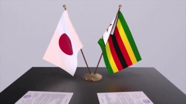 Zimbabve ve Japonya ulusal bayrakları, politik anlaşma, diplomatik toplantı. Politika ve iş animasyonu