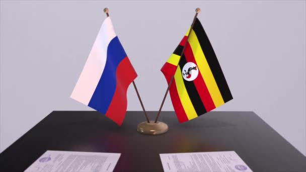 ウガンダとロシアの国旗 ビジネス会議や外交協定 政治協定アニメーション — ストック動画