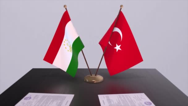 Σημαίες Τατζικιστάν Και Τουρκίας Στη Συνεδρίαση Πολιτικής Κινούμενα Σχέδια Επιχειρηματικών — Αρχείο Βίντεο