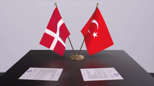 Denmark and Turkey flags at politics meeting. Business deal 3D illustration.