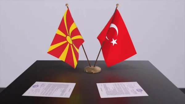 North Macedonia and Turkey flags at politics meeting. Business deal 3D illustration.