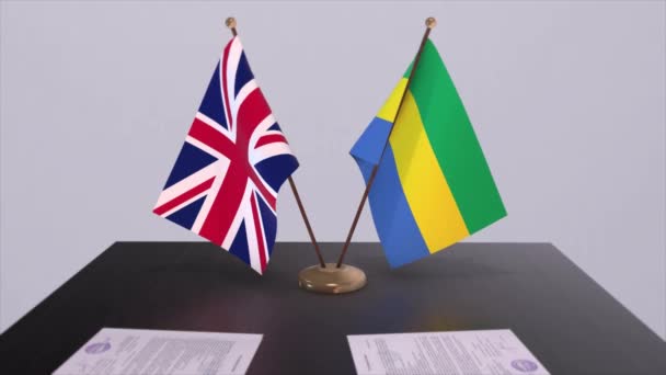 Флаг Габона Великобритании Концепция Политики Партнерские Отношения Между Странами Соглашение — стоковое видео