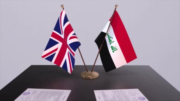伊拉克和英国的国旗 政治概念 伙伴交易甲虫之间的国家 各国政府的伙伴关系协定 — 图库视频影像