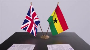 Gana ve İngiliz bayrağı. Siyaset konsepti, ülkeler arasında ortaklık anlaşması. Hükümetlerin ortaklık anlaşması