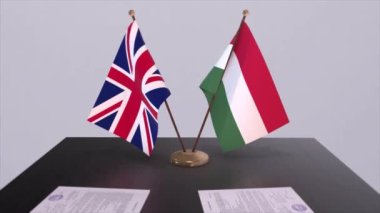 Macaristan ve İngiltere bayrağı. Siyaset konsepti, ülkeler arasında ortaklık anlaşması. Hükümetlerin ortaklık anlaşması