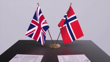 Norveç ve İngiltere bayrağı. Siyaset konsepti, ülkeler arasında ortaklık anlaşması. Hükümetlerin ortaklık anlaşması