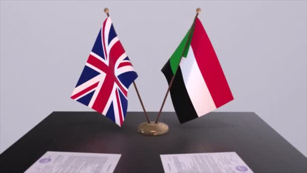 苏丹和英国国旗 政治概念 伙伴交易甲虫之间的国家 各国政府的伙伴关系协定 — 图库视频影像