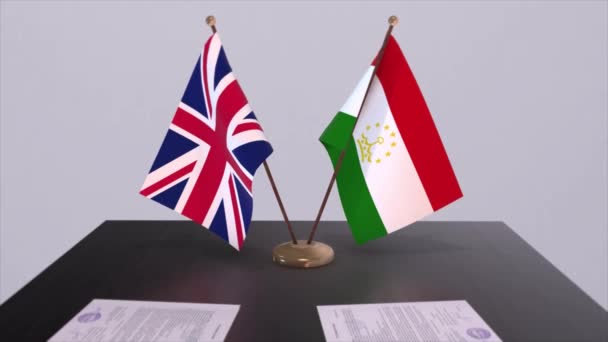 Tádžikistán Vlajka Spojeného Království Politický Koncept Partnerská Dohoda Mezi Zeměmi — Stock video