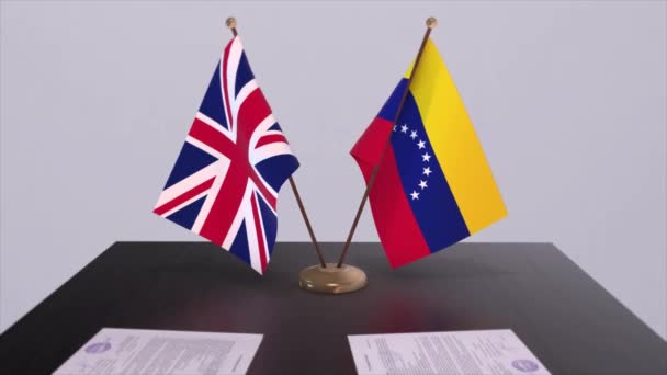 Флаг Венесуэлы Великобритании Концепция Политики Партнерские Отношения Между Странами Соглашение — стоковое видео