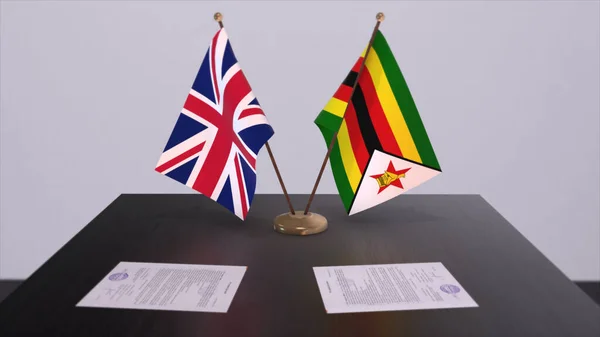 Zimbabwe and UK flag. Politics concept, partner deal beetween countries. Partnership agreement of governments 3D illustration.