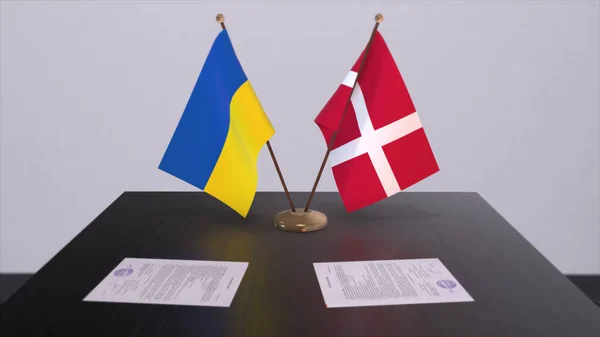 Denmark and Ukraine flags on politics meeting 3D illustration.