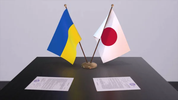Japan and Ukraine flags on politics meeting 3D illustration.