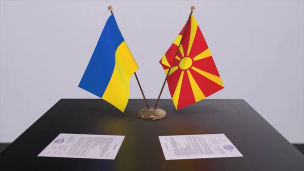 North Macedonia and Ukraine flags on politics meeting 3D illustration.