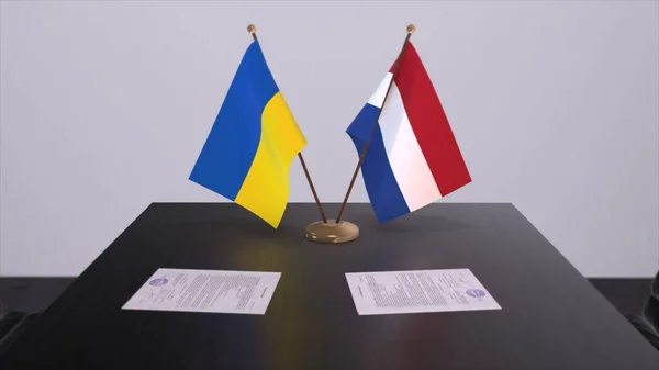 Netherlands and Ukraine flags on politics meeting 3D illustration.