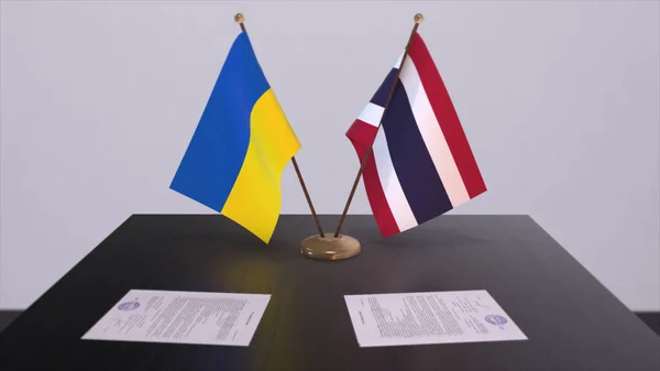 Thailand and Ukraine flags on politics meeting 3D illustration.