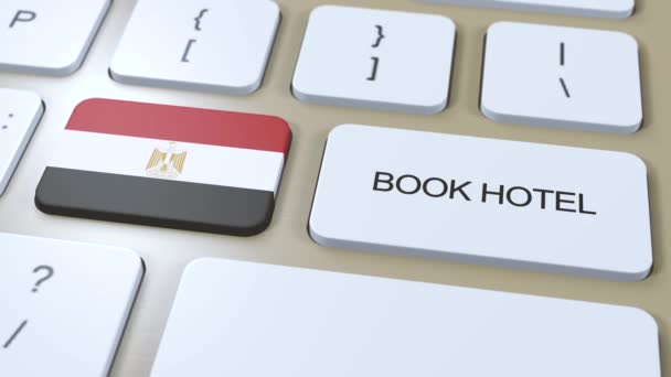 ホテルでエジプト エジプト コンピューターのキーボードのボタン 旅行のコンセプト3Dアニメーション ホテルのテキストとエジプト国旗を予約する — ストック動画