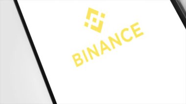 New York, ABD - 1 Mayıs 2023: Telefon Ekran Animasyonu Binance Logosu, İllüstrasyon Editörü.