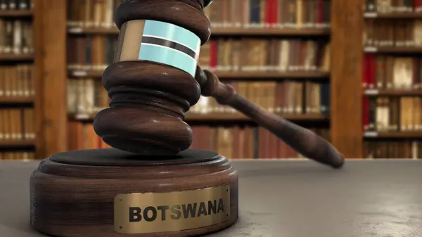 stock image Botswana Flag on Judge Gavel or Hammer in Court with Country Name. Legal System 3D Illustration.