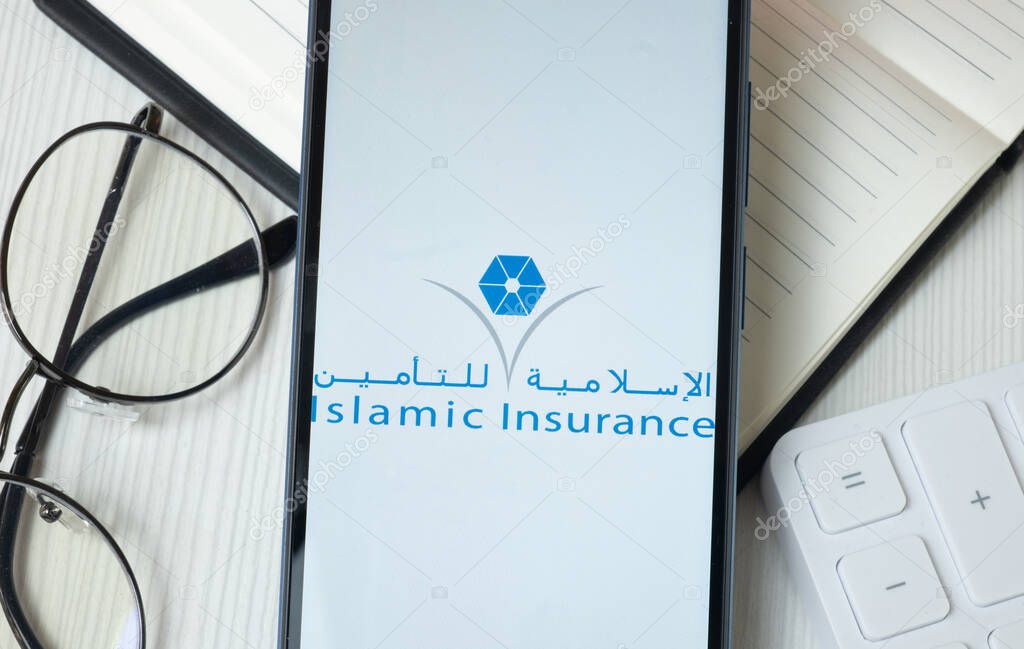 New York, USA - 21 June 2024: Qatar Islamic Insurance Group Logo on Phone Screen, Company Icon.