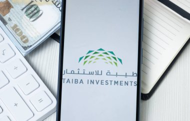 New York, ABD - 30 Haziran 2024: Taiba Yatırım Logosu Telefon Ekranı, Şirket Simgesi.